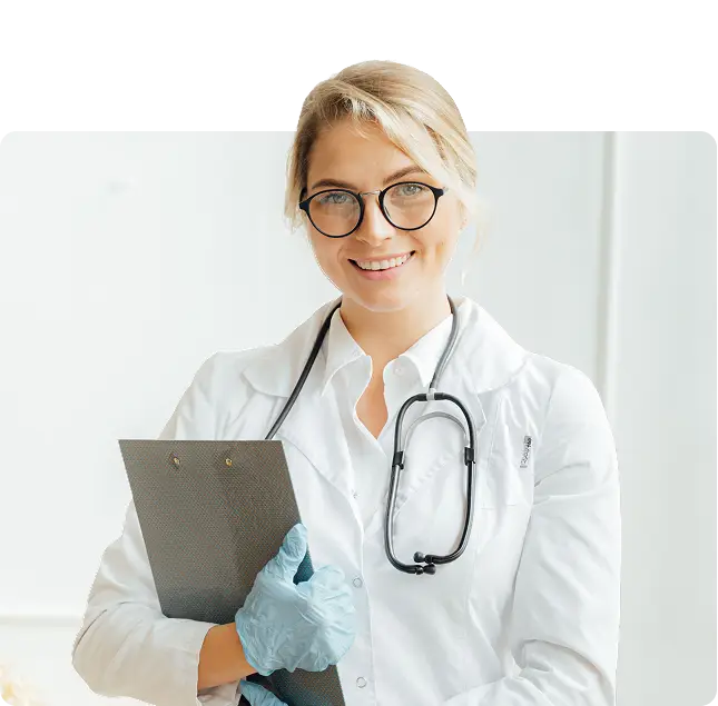 Female physician in a white coat with a stethoscope holding a clipboard